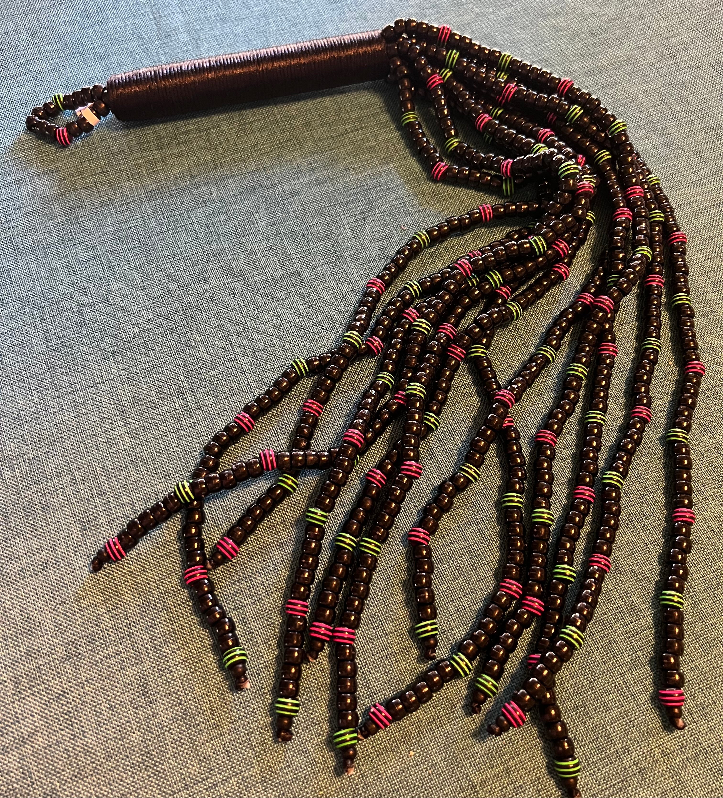 Black beaded flogger