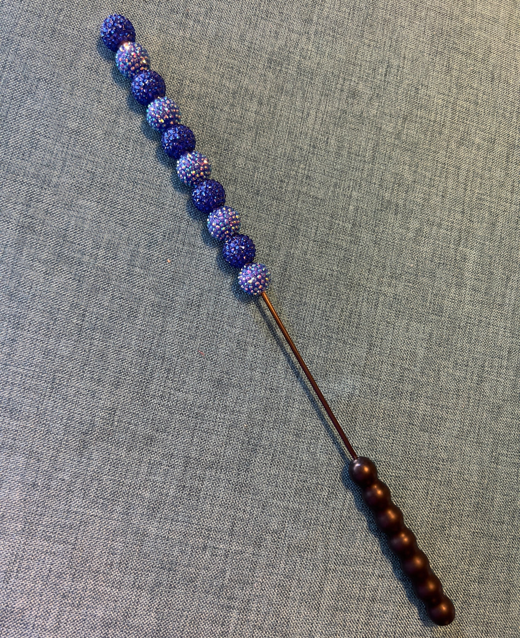 Blue jeweled beater bar