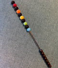 Black and rainbow jeweled beater bar