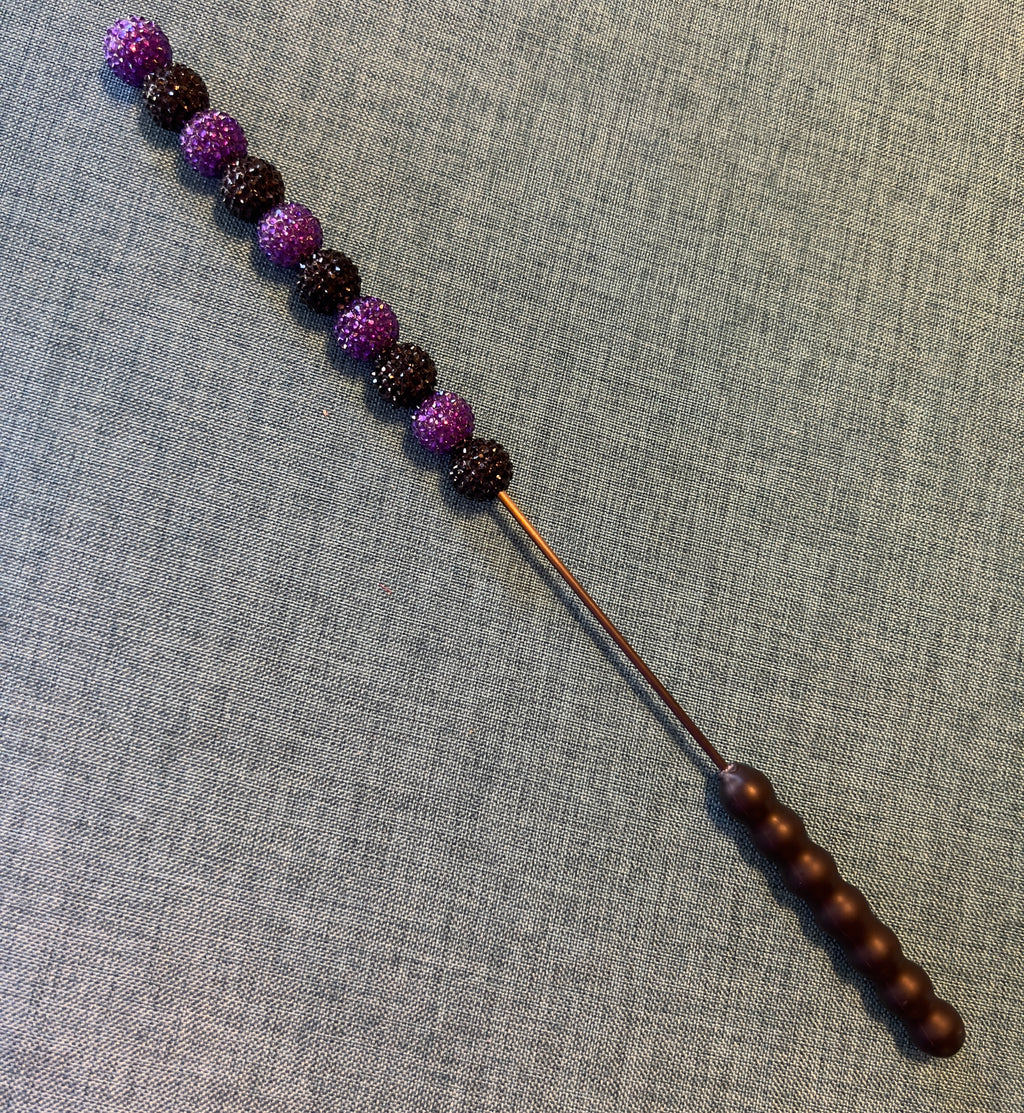 Purple and black jeweled beater bar
