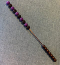Purple and black jeweled beater bar