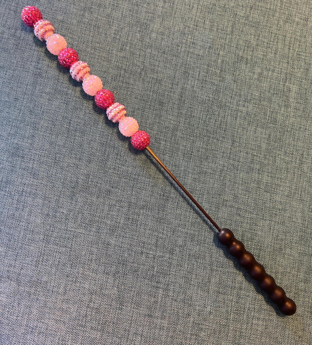 Pink jeweled beater bar