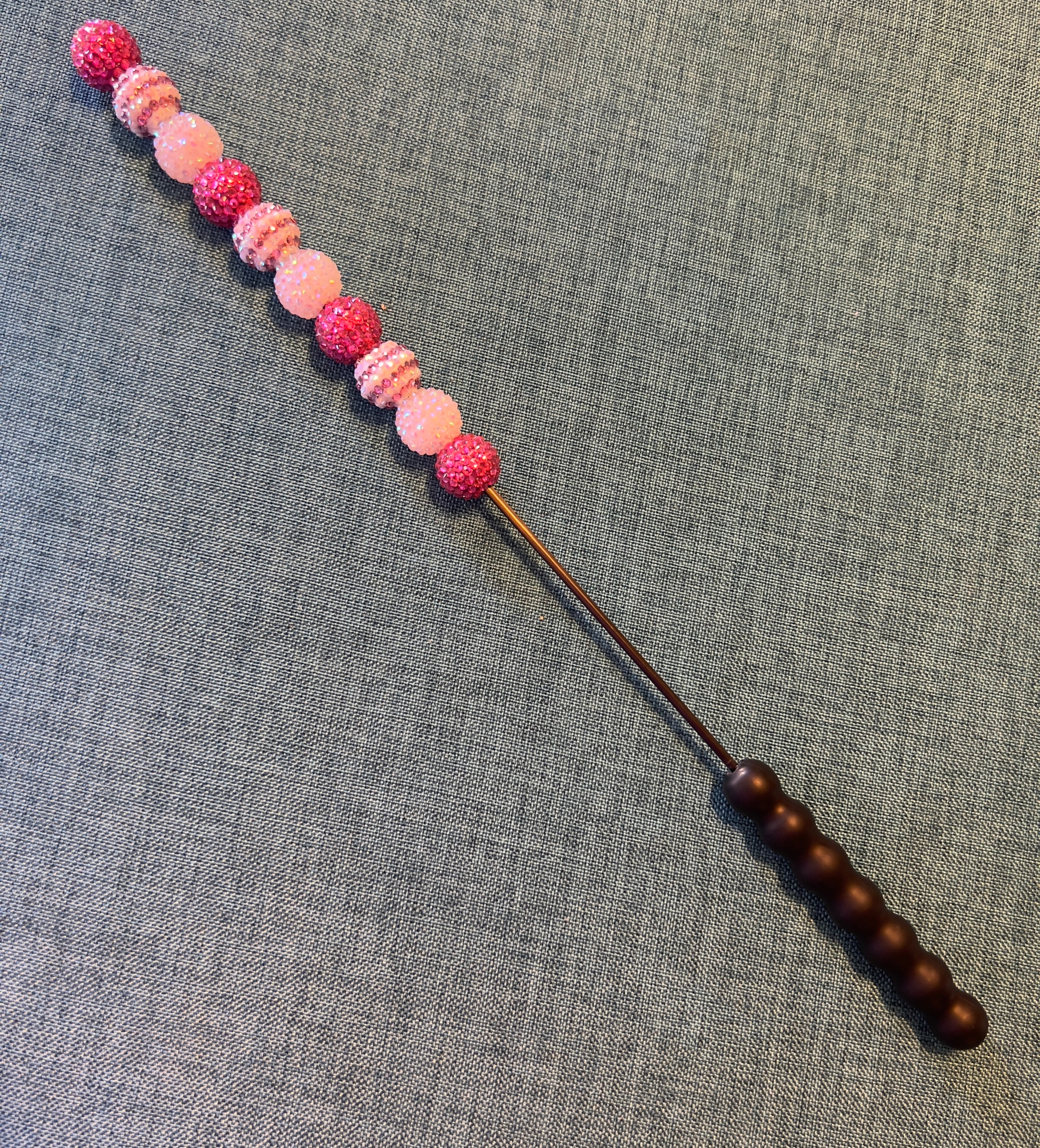 Pink jeweled beater bar