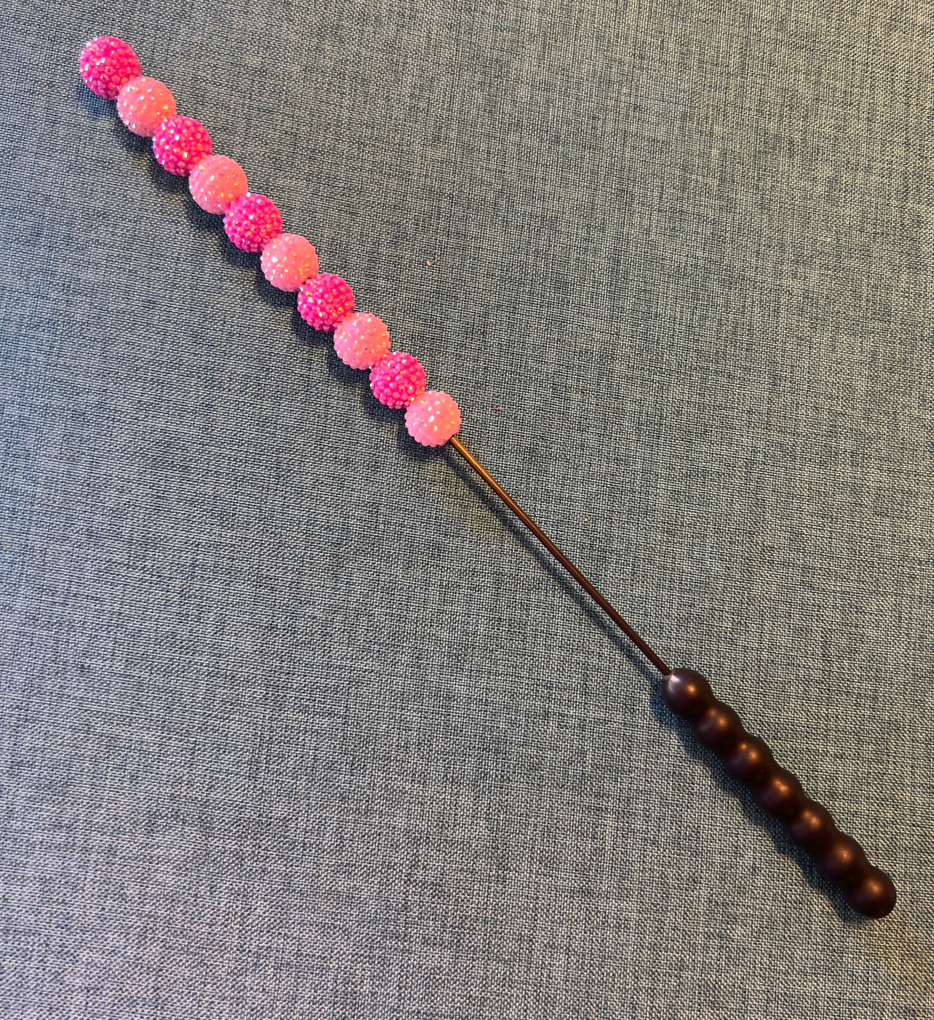 Pink jeweled beater bar