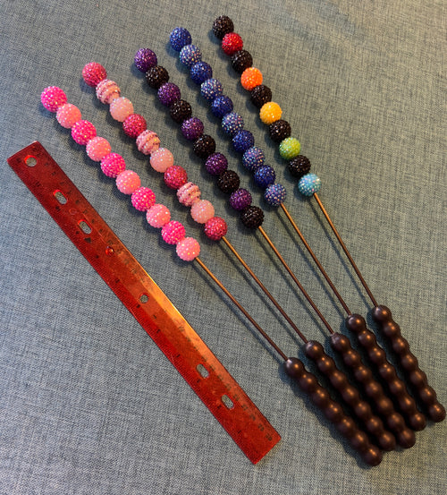 Black and rainbow jeweled beater bar